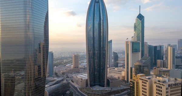 "الوطني": ستراتيجية التنويع حدَّت من تأثيرات التوترات الجيوسياسية 