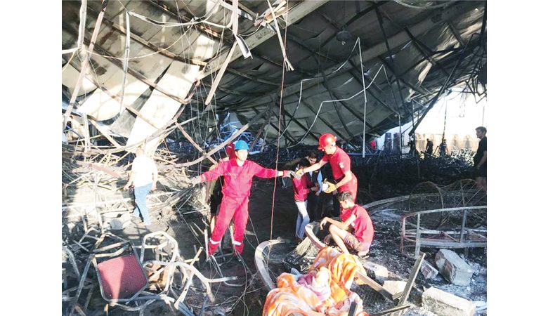 العراق: 114 قتيلاً و300 مصاب في حريق كارثي داخل صالة للأعراس