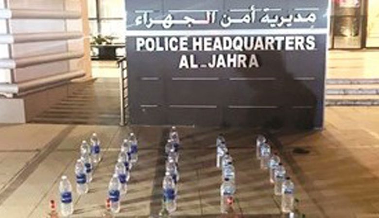 ضبط آسيوي بـ 100 زجاجة خمر محلية جاهزة للبيع