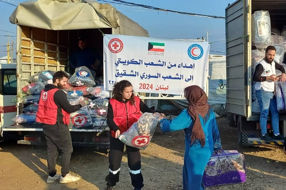 &laquo;الهلال الأحمر&raquo; يوزع مساعدات على المتضررين من فيضان &laquo;النهر الكبير&raquo; بلبنان
